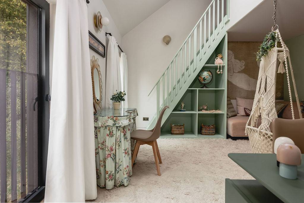Kids bedroom suite featuring a mint green staircase, built-in display shelves, and dressing table, Love Locations GU32.
