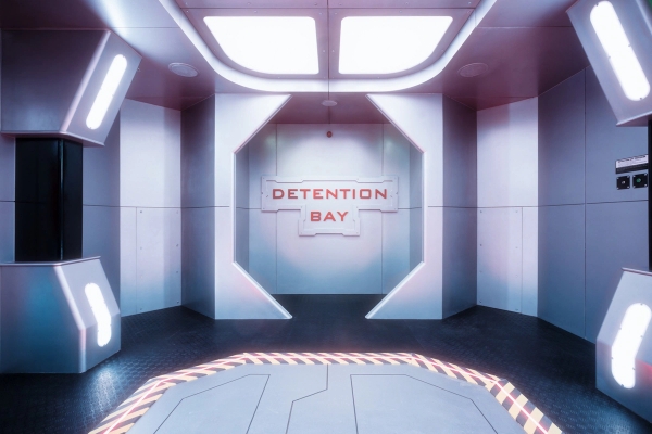 Symmetrical view of a futuristic spaceship detention bay holding cell set for movie productions, listed on Love Locations SE1.