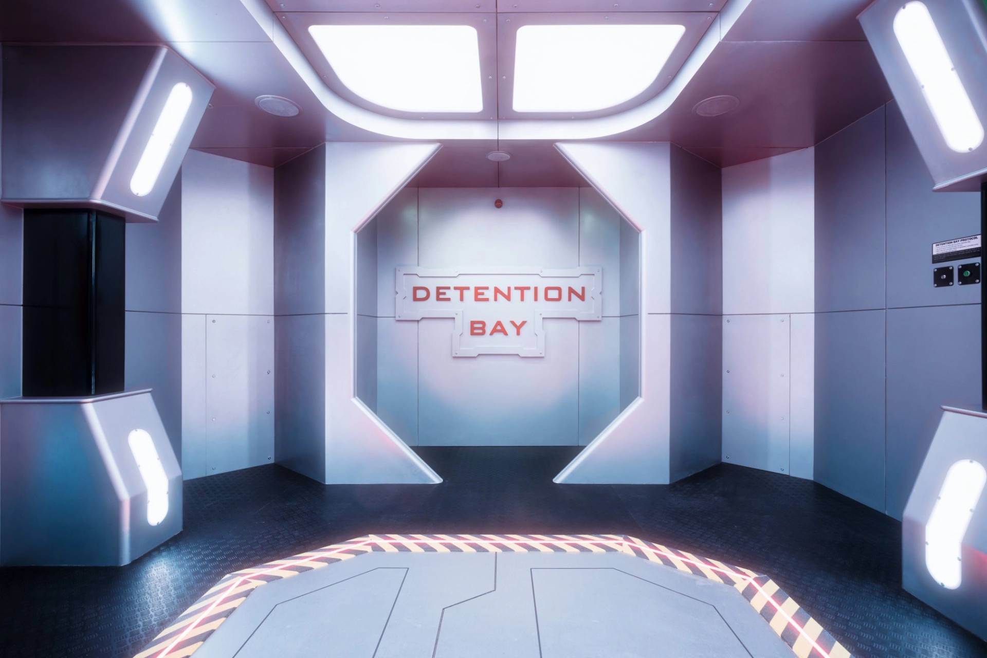 Symmetrical view of a futuristic spaceship detention bay holding cell set for movie productions, listed on Love Locations SE1.