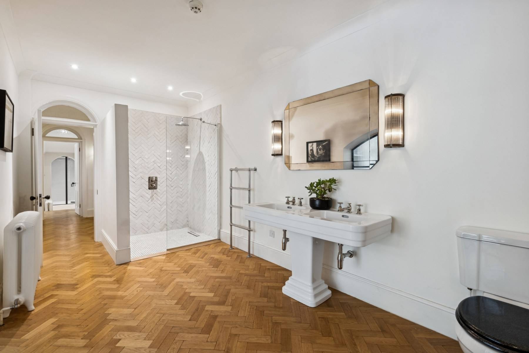Spacious master bathroom shoot space with walk-in shower and double vanity in Hampstead by Love Locations.