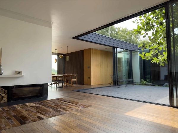 Courtyard-facing living room at Highgate Zen Love Locations modern property.