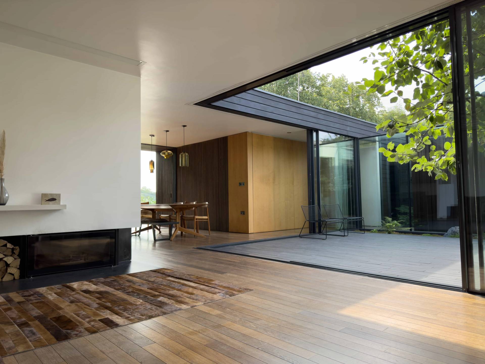 Courtyard-facing living room at Highgate Zen Love Locations modern property.