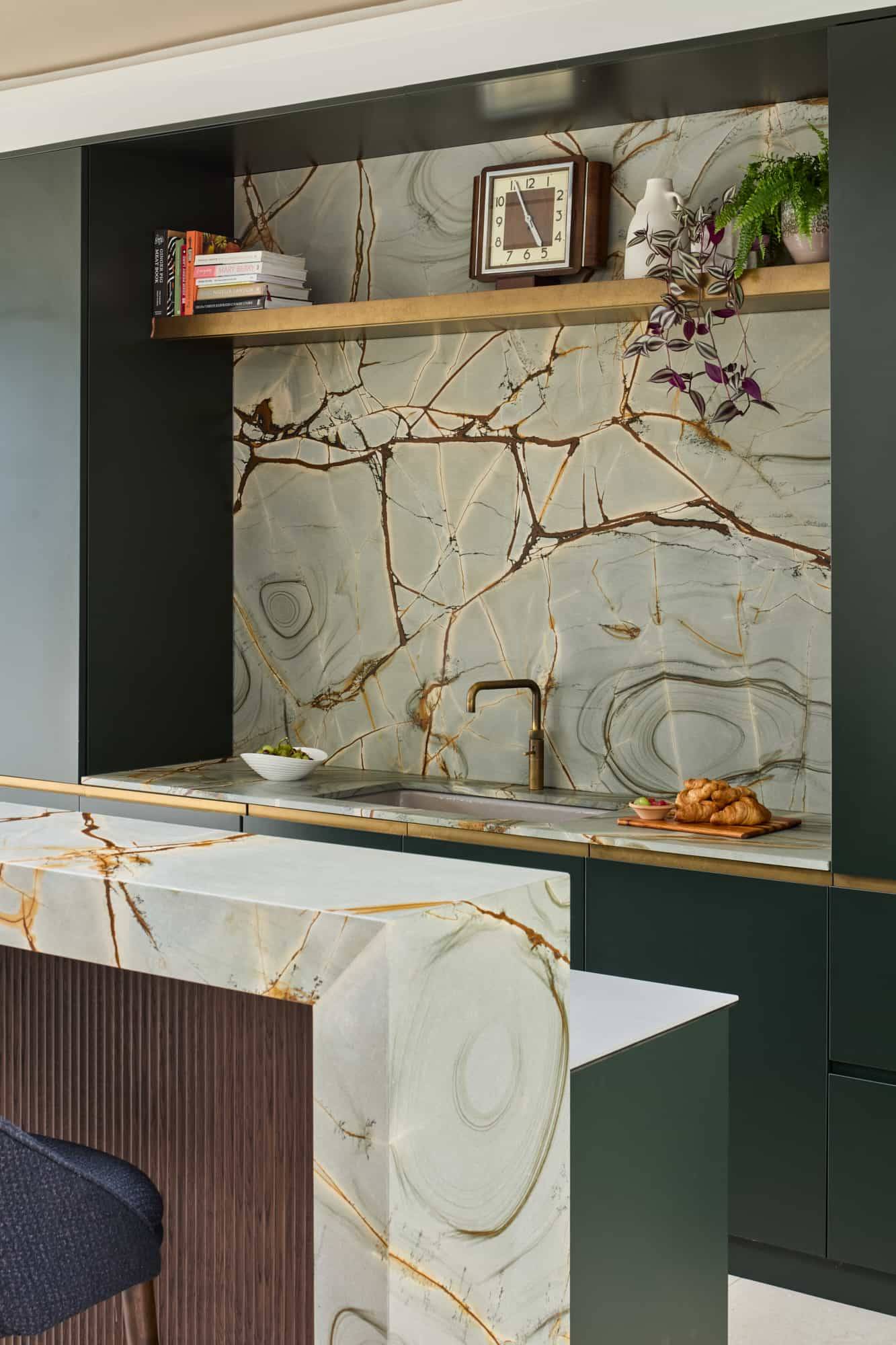 Close-up of luxury green marble kitchen splashback and waterfall island counter detail, perfect for high-end appliance marketing, Love Locations KT22.