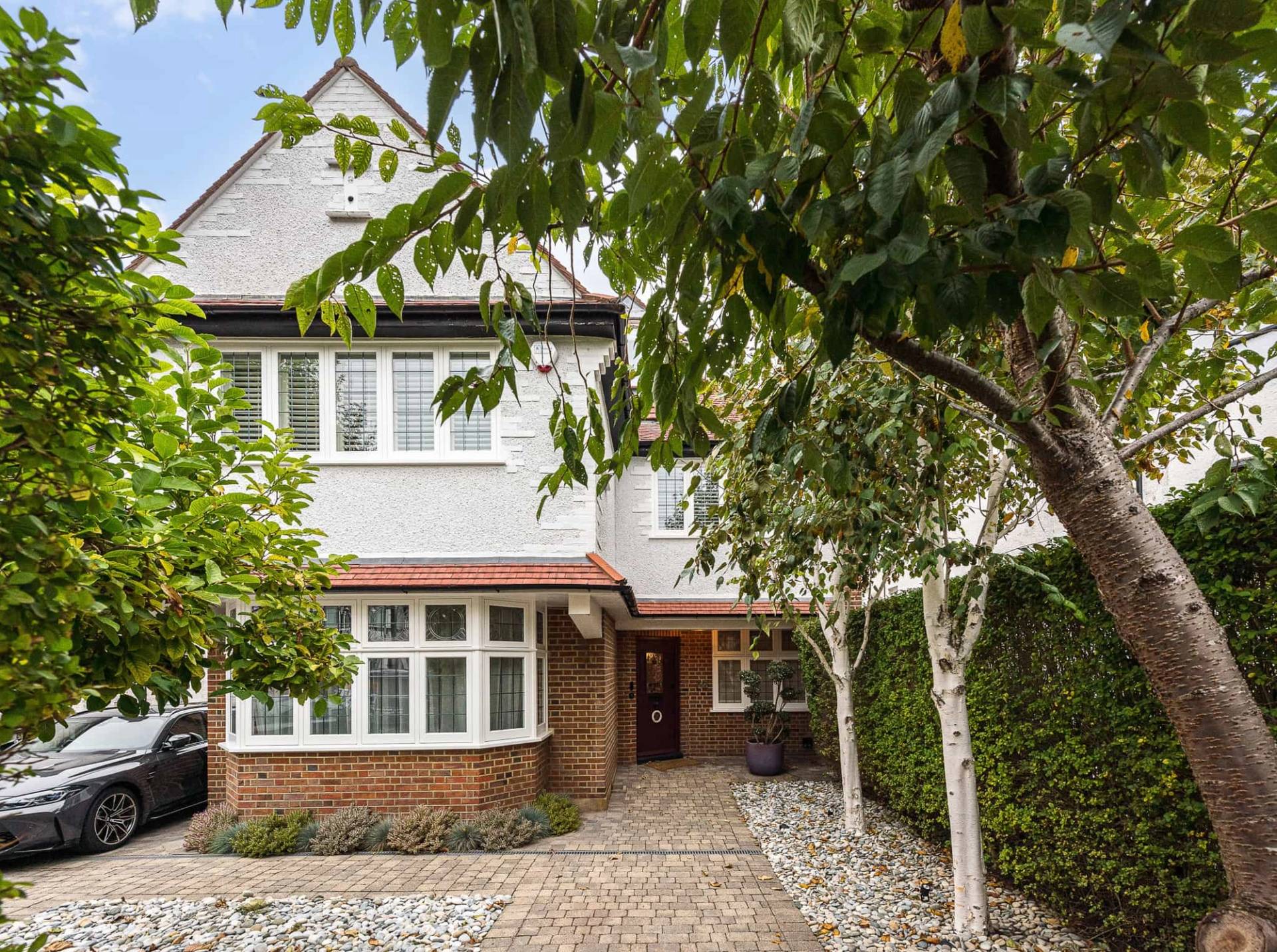 Kitchen and seating area overlooking garden in NW2, Love Locations