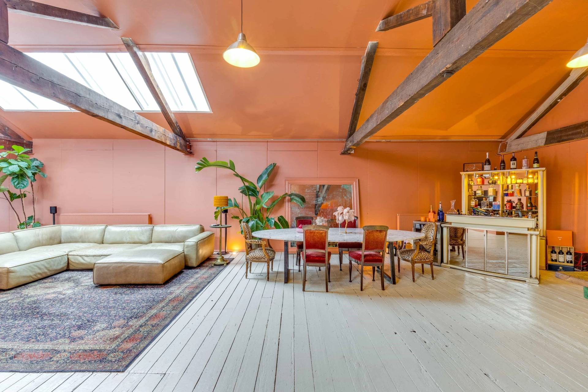 Characterful creative space with exposed wooden beams and white-washed flooring planks, listed with Love Locations Richmond.