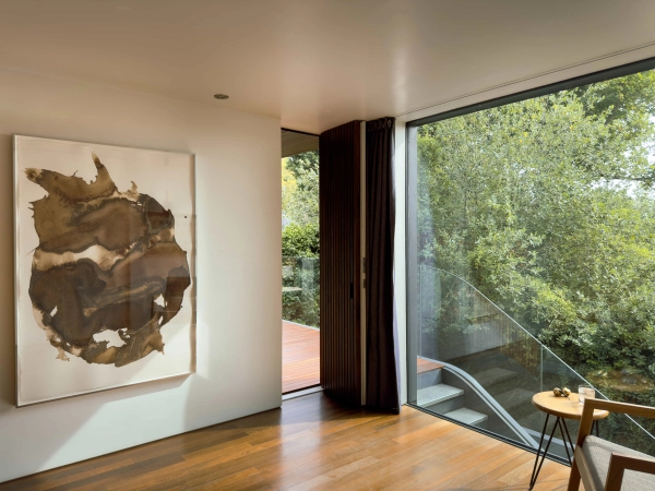 Spacious guest bedroom at Highgate Zen Love Locations property with contemporary décor.