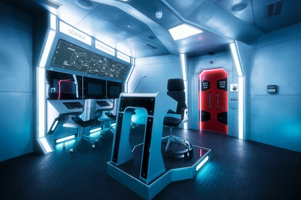 Futuristic spaceship command console next to a blast door entry, ideal for immersive filming and media hire via Love Locations.
