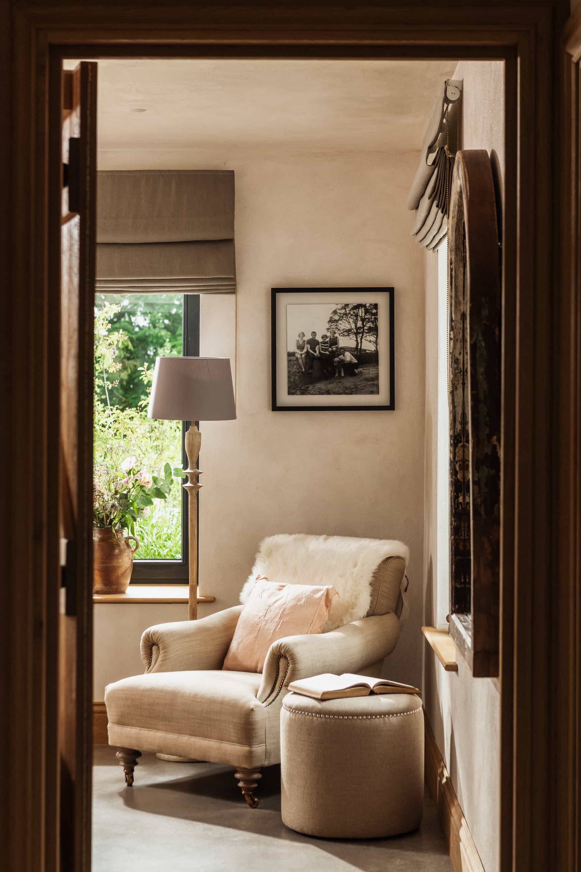 Boutique bedroom corner with a comfortable reading chair and sash window in Castleblayney County Monaghan Ireland through Love Locations.
