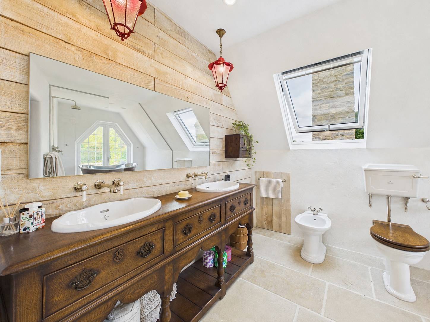 Love Locations bright bathroom with skylights and wooden vanity for filming