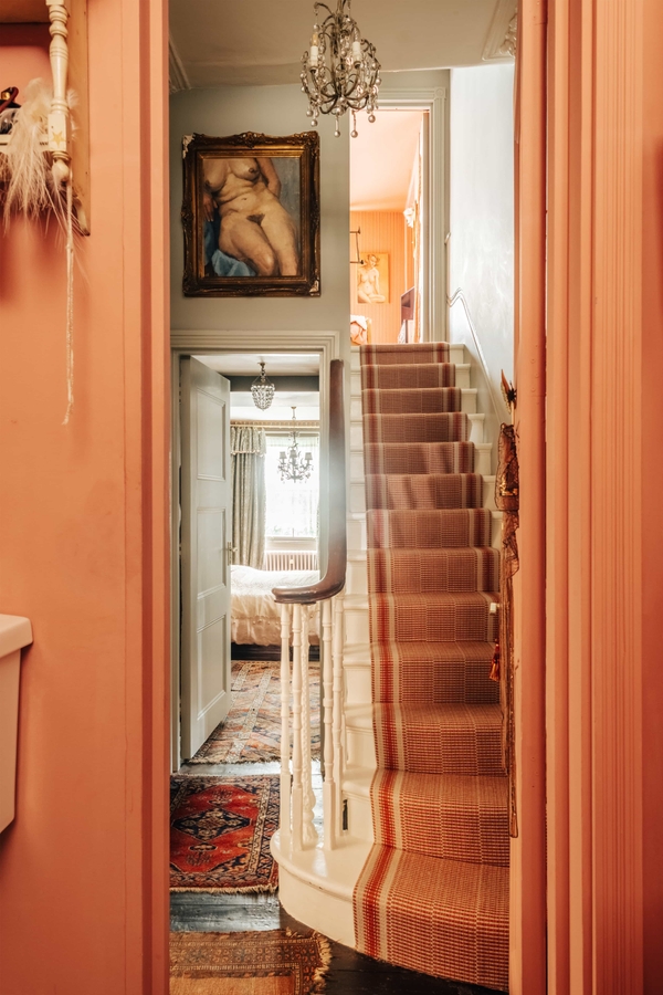 Classic Victorian interior with fireplace and framed artwork in Hackney E8 – Love Locations