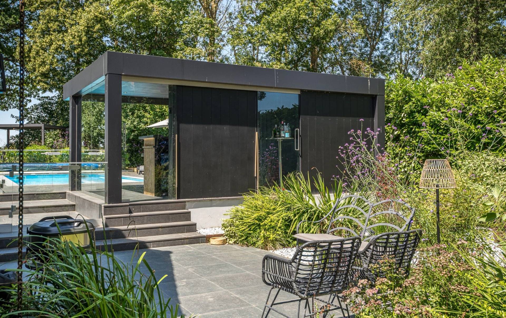 Contemporary black timber clad garden room and outdoor entertainment outhouse venue in Chelmsford, Essex, Love Locations.