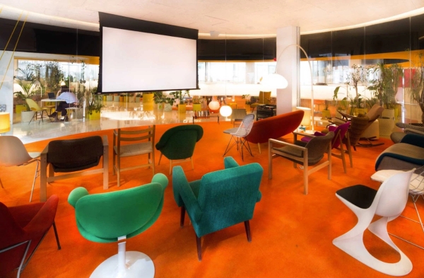 Modern East London study lounge with curved glass architecture in Whitechapel E1 – love locations