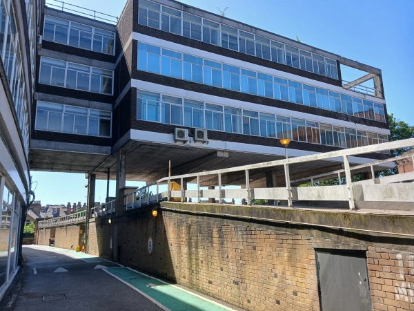 Urban brutalist concrete structure and raised walkway location home in Watford WD18 through Love Locations, perfect for gritty cinematic backdrops.