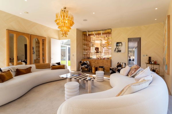 Love Locations luxury estate location GU8: Expansive dual-lounge layout showing high-concept minimalist furniture design, configured for lifestyle catalogs and TV family scenes.