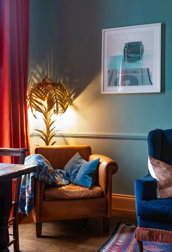 Atmospheric living room corner with a leather armchair and soft ambient lighting, a lifestyle shoot location in Westminster SW1V from Love Locations.
