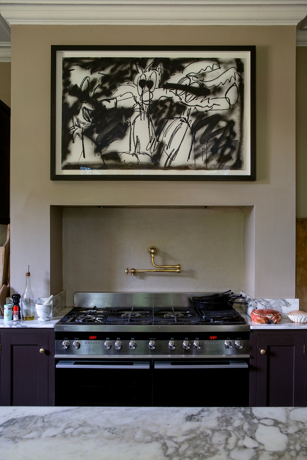 Kitchen Range cooker alcove with stainless steel extractor hood and marble worktops, Love Locations ME13.