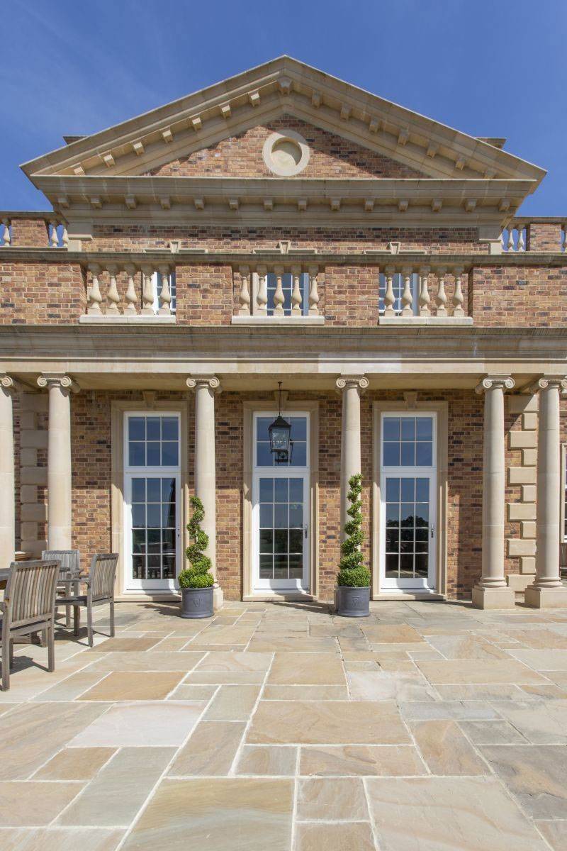 Symmetric Georgian architecture and grand terrace at Greentrees, a premium location for luxury brand campaigns via Love Locations.