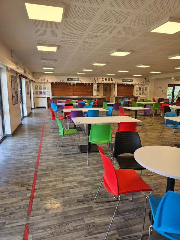 Large school cafeteria shoot space showing open seating layouts and dining hall facilities, available for media production through Love Locations.