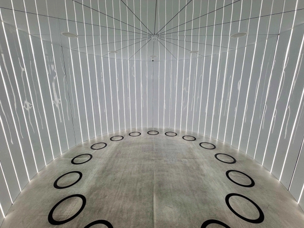 Abstract futuristic warp core or teleportation room location space with vertical white strip lighting, Love Locations Lambeth.
