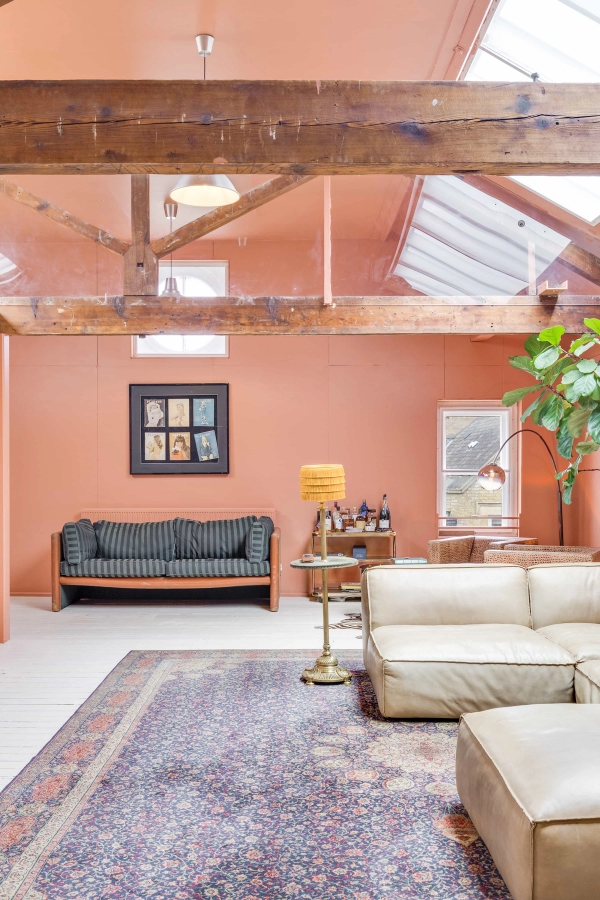 Retro-styled residential filming location featuring vintage furniture and cozy seating setups in London, listed on Love Locations.