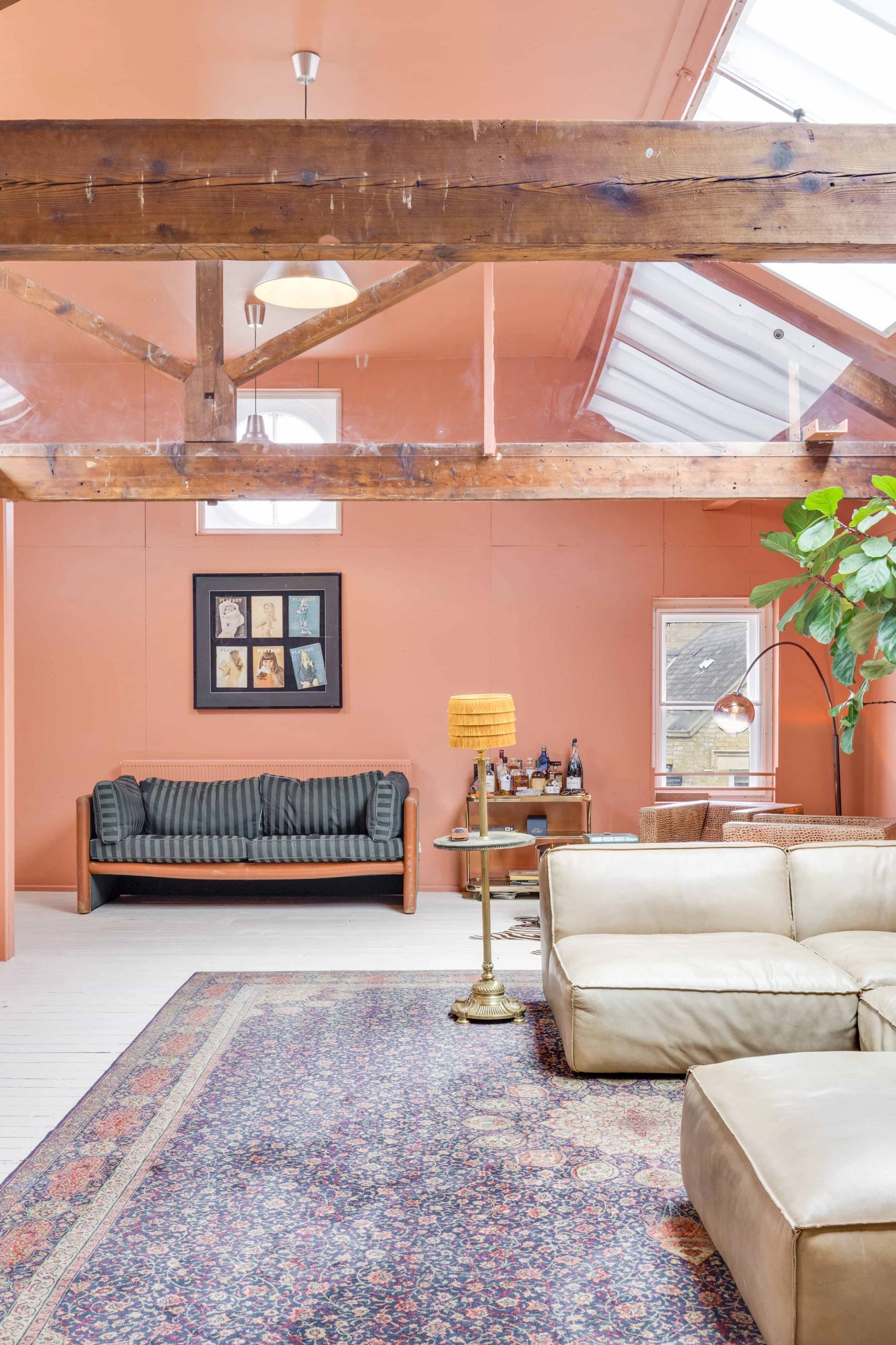 Retro-styled residential filming location featuring vintage furniture and cozy seating setups in London, listed on Love Locations.