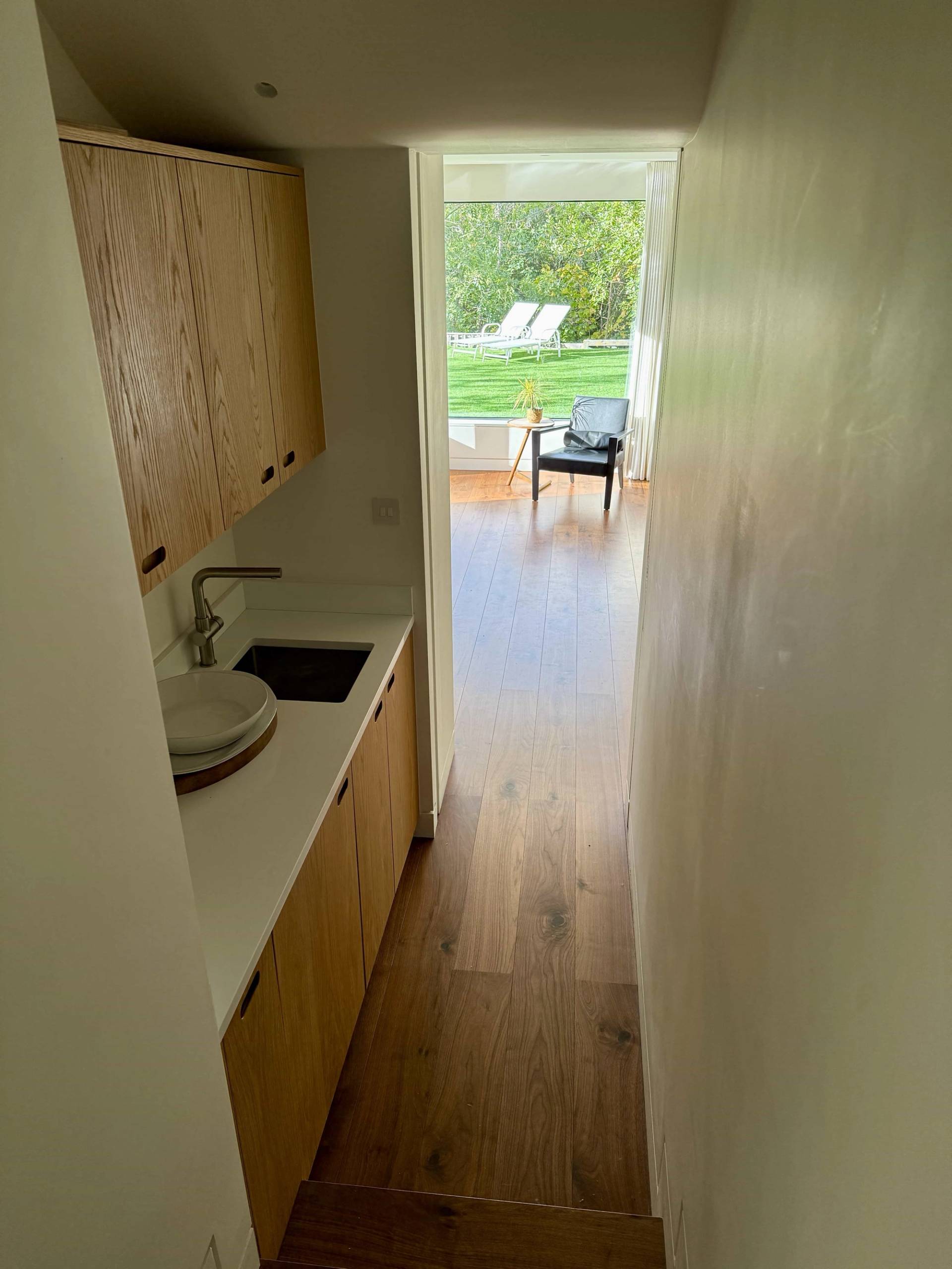 Exterior walkway alongside mid-century house
