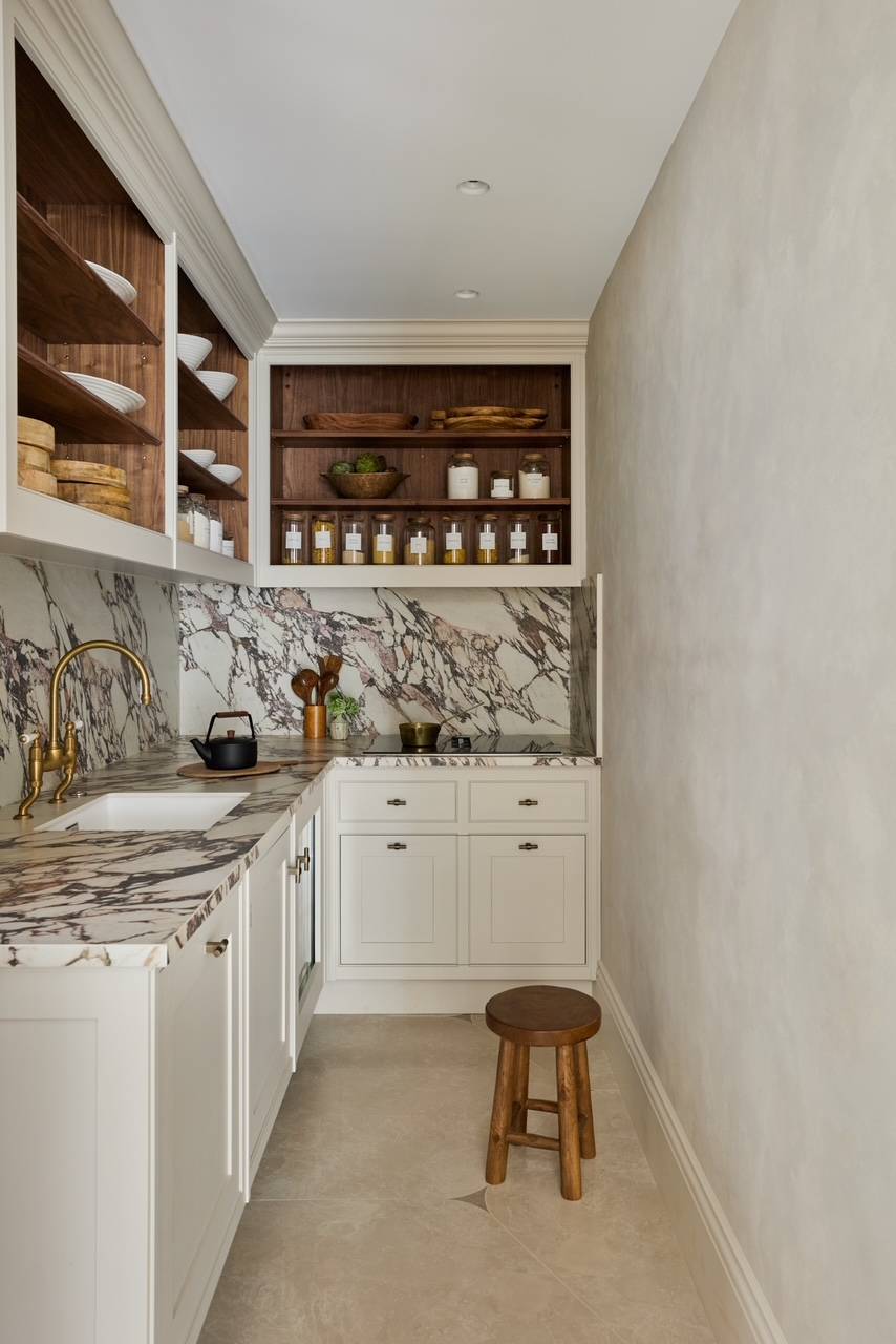 Stunning butler's pantry shoot location in Hertfordshire, WD23 featuring elegant marble splashbacks and bespoke timber shelving, great for household brand advertising, Love Locations.