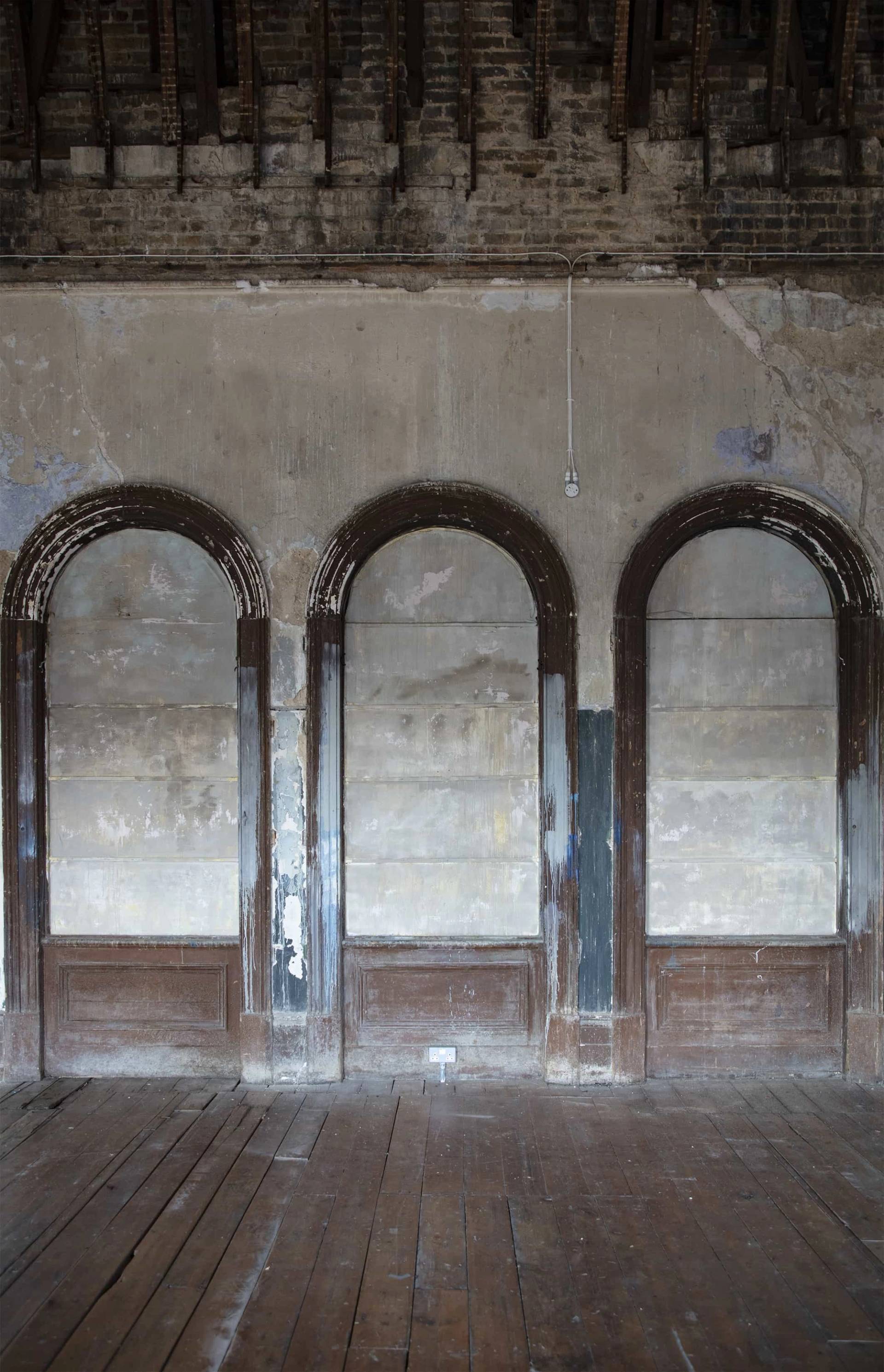 Industrial-style derelict billiards room at Peckham Rye station, available to hire through Love Locations for large events, filming, or art installations.
