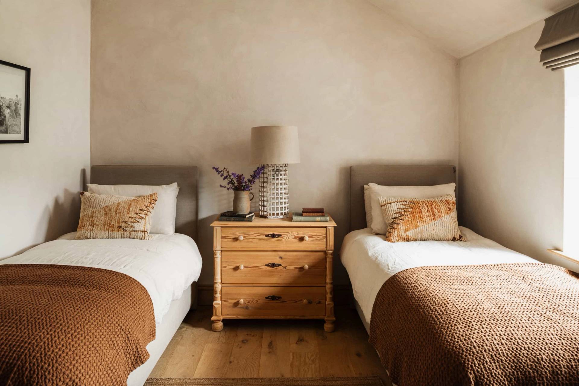 Twin bedroom photoshoot location in Castleblayney County Monaghan Ireland from Love Locations, with sloped ceilings, twin beds, and neutral linen bedding.