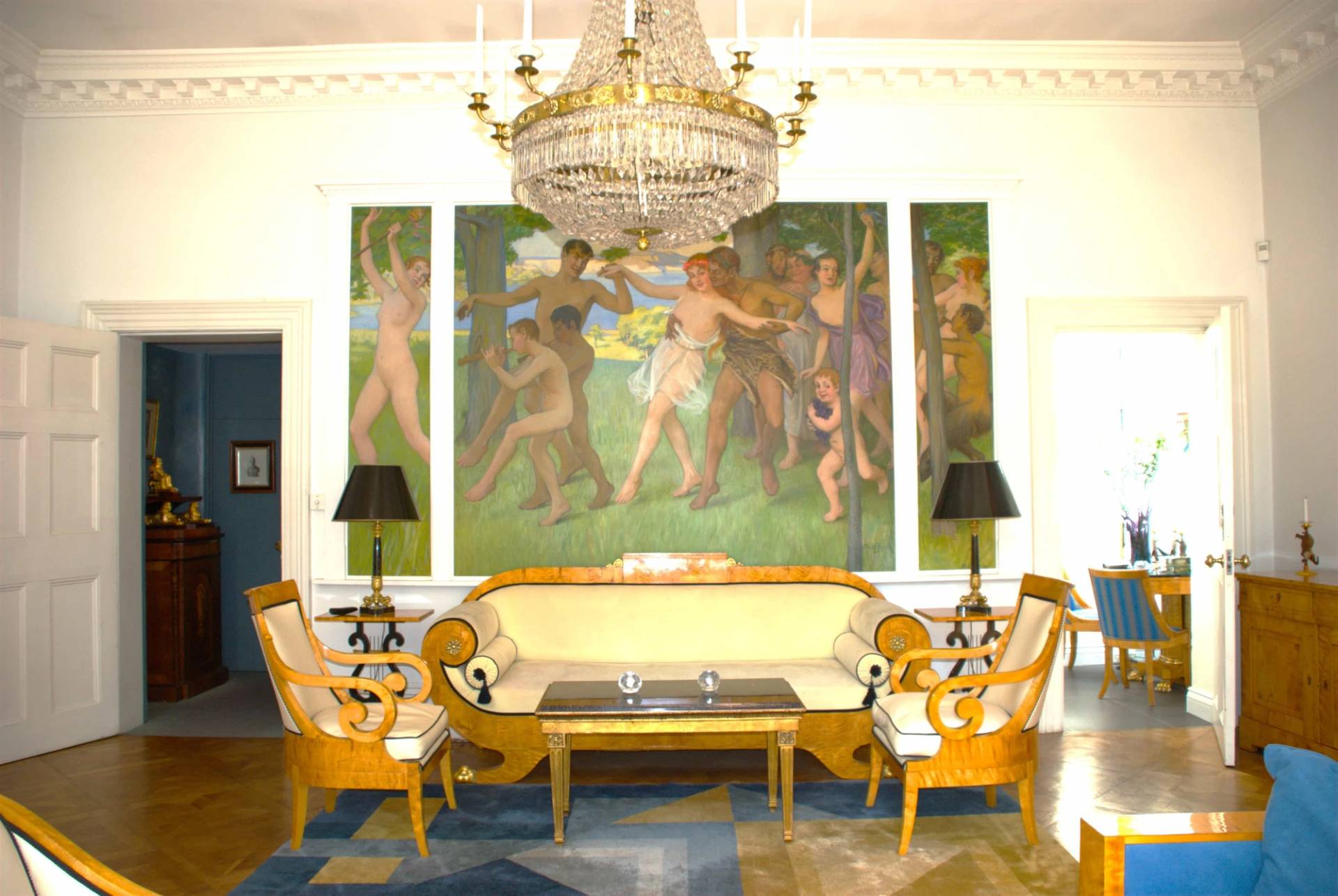 Grand drawing room featuring classical wall murals, gilded sofa set, crystal chandelier, and geometric rug in Kensington and Chelsea, perfect for luxury brand campaigns, Love Locations SW5.