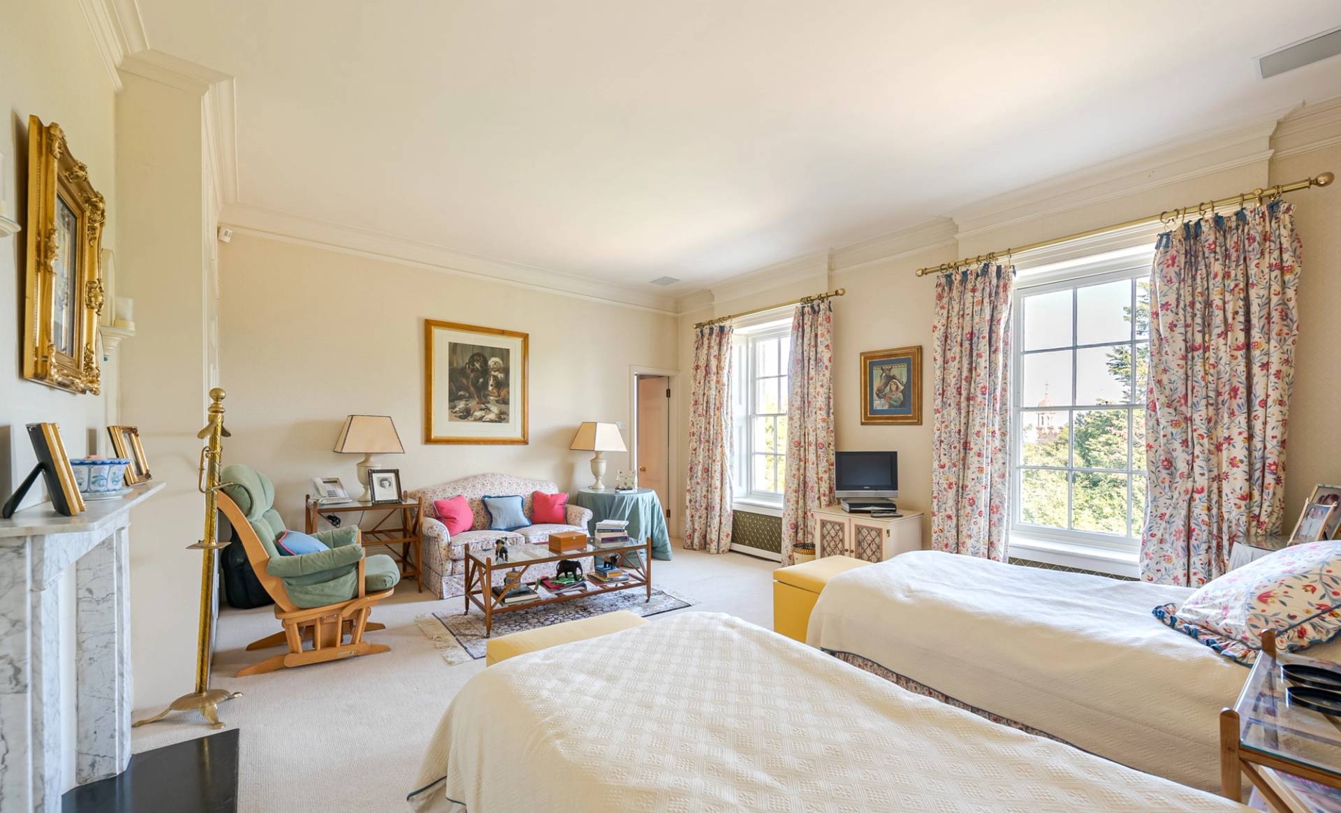 Expansive emerald lawns stretching across twelve acres.