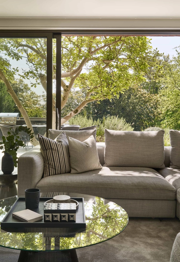 Bright, sun-drenched living room shoot location with panoramic views of mature gardens in Chislehurst, Love Locations.