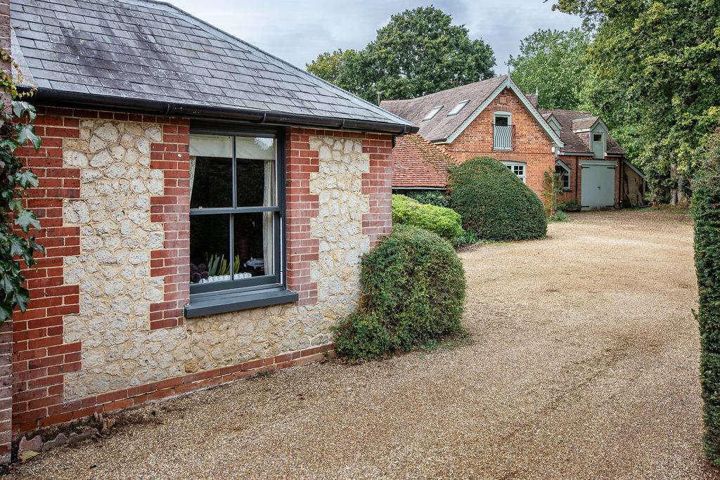 Converted brick outbuilding with original features at Love Locations property in Liss, Hampshire GU33.
