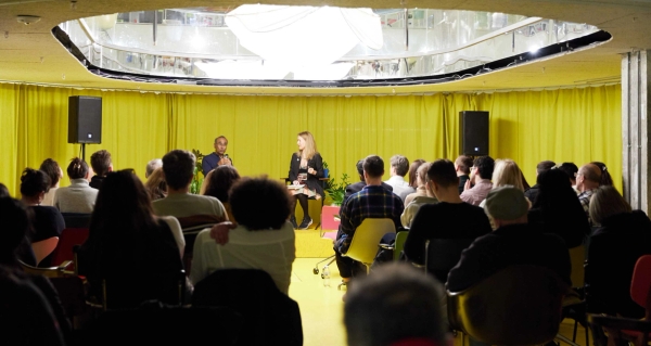 Modern London event space with colourful seating and presentation setup in Whitechapel East London – love locations