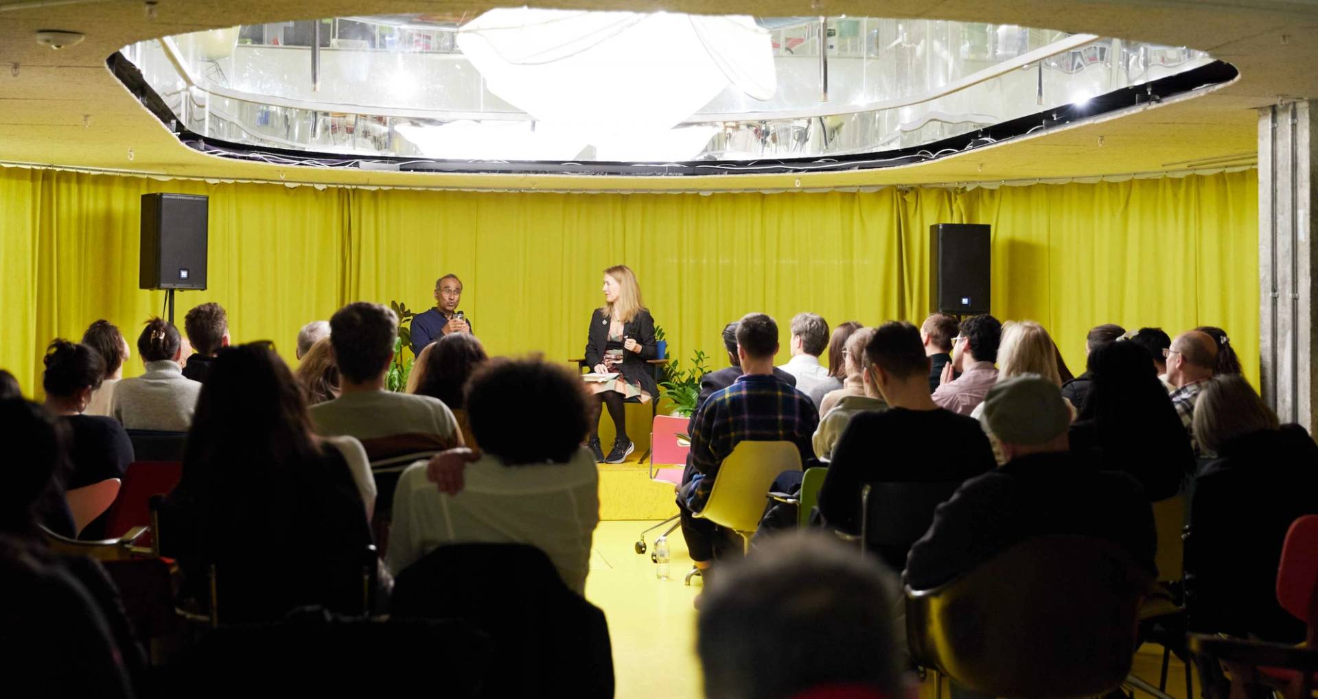Modern London event space with colourful seating and presentation setup in Whitechapel East London – love locations