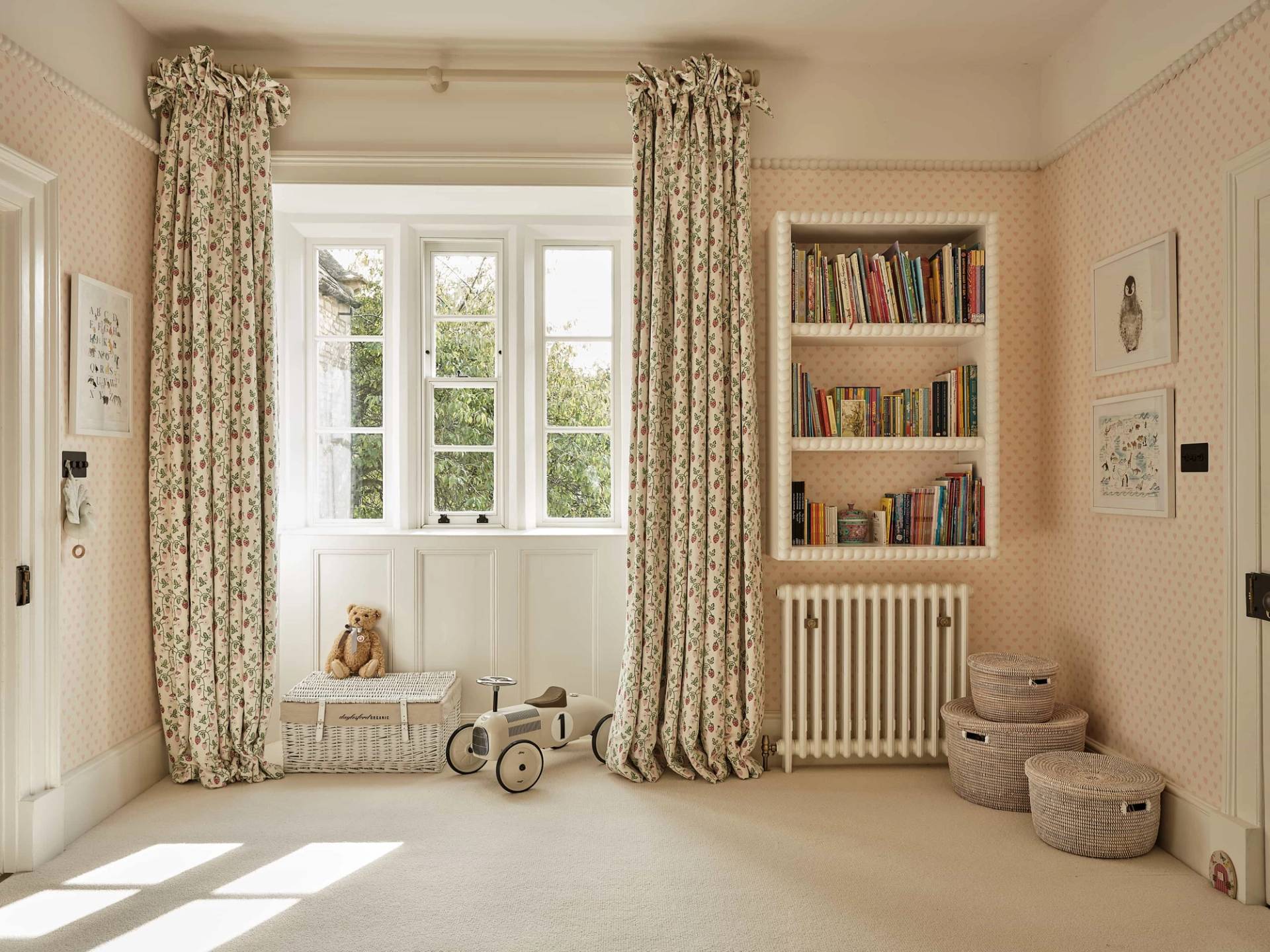 Bright kids bedroom with sash windows, patterned curtains, and plush neutral carpet flooring, Love Locations OX7.