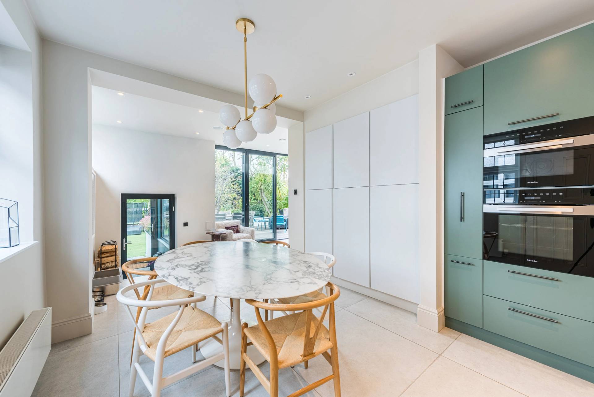 Open-plan kitchen and dining area in NW2 home, Love Locations