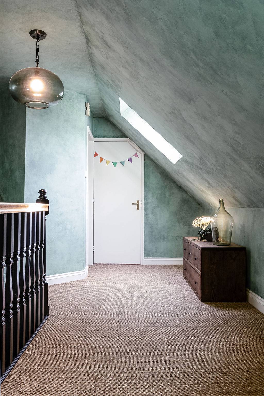 Spacious landing with sloping ceilings and character details at Love Locations property in Liss, Hampshire GU33.