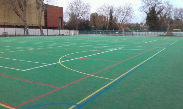 Generous outdoor sports pitch area at a London secondary school, ideal for sports commercial production, Love Locations.