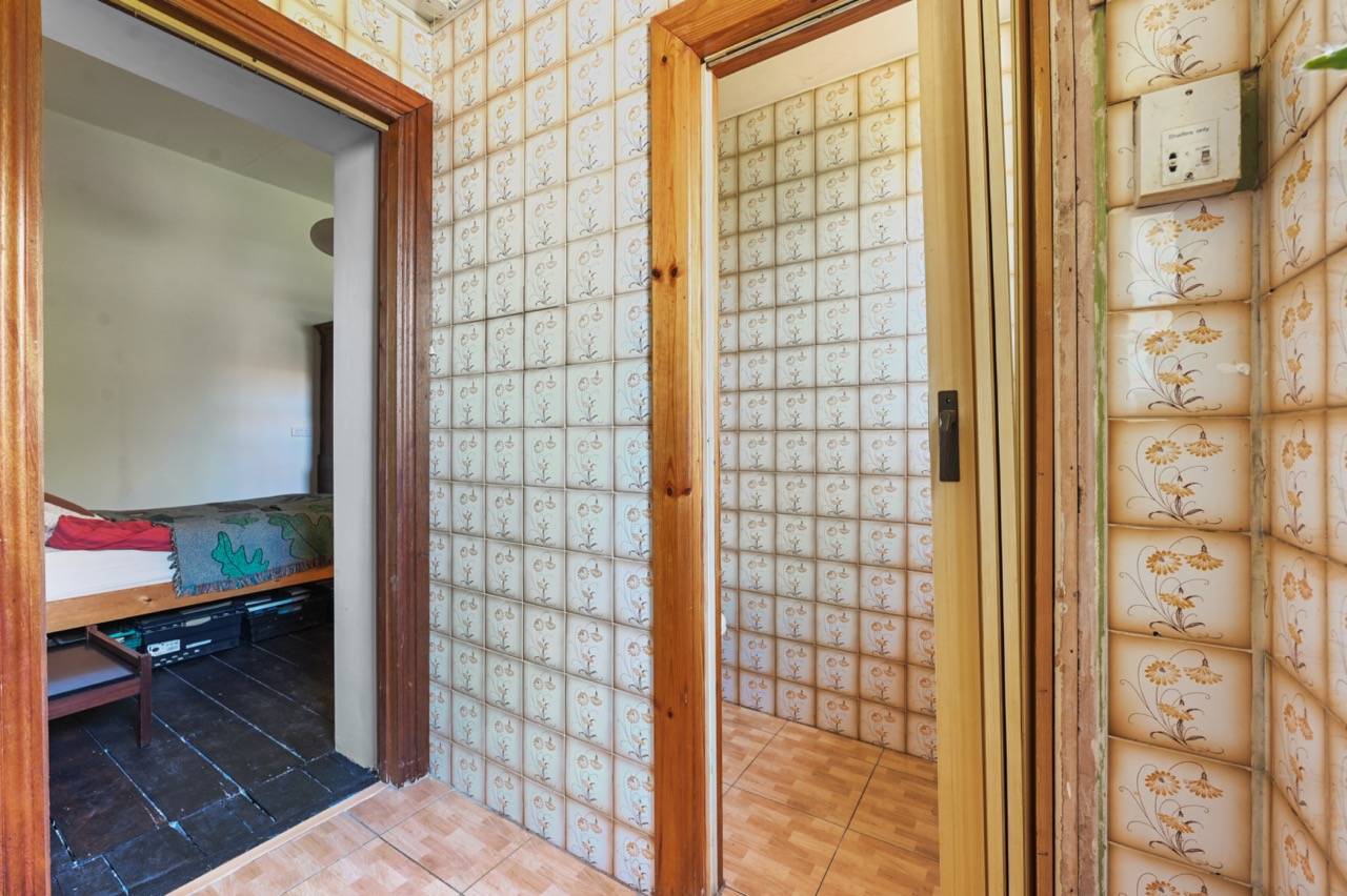 Retro tiled hallway doorway transition set with timber door frames, Love Locations.