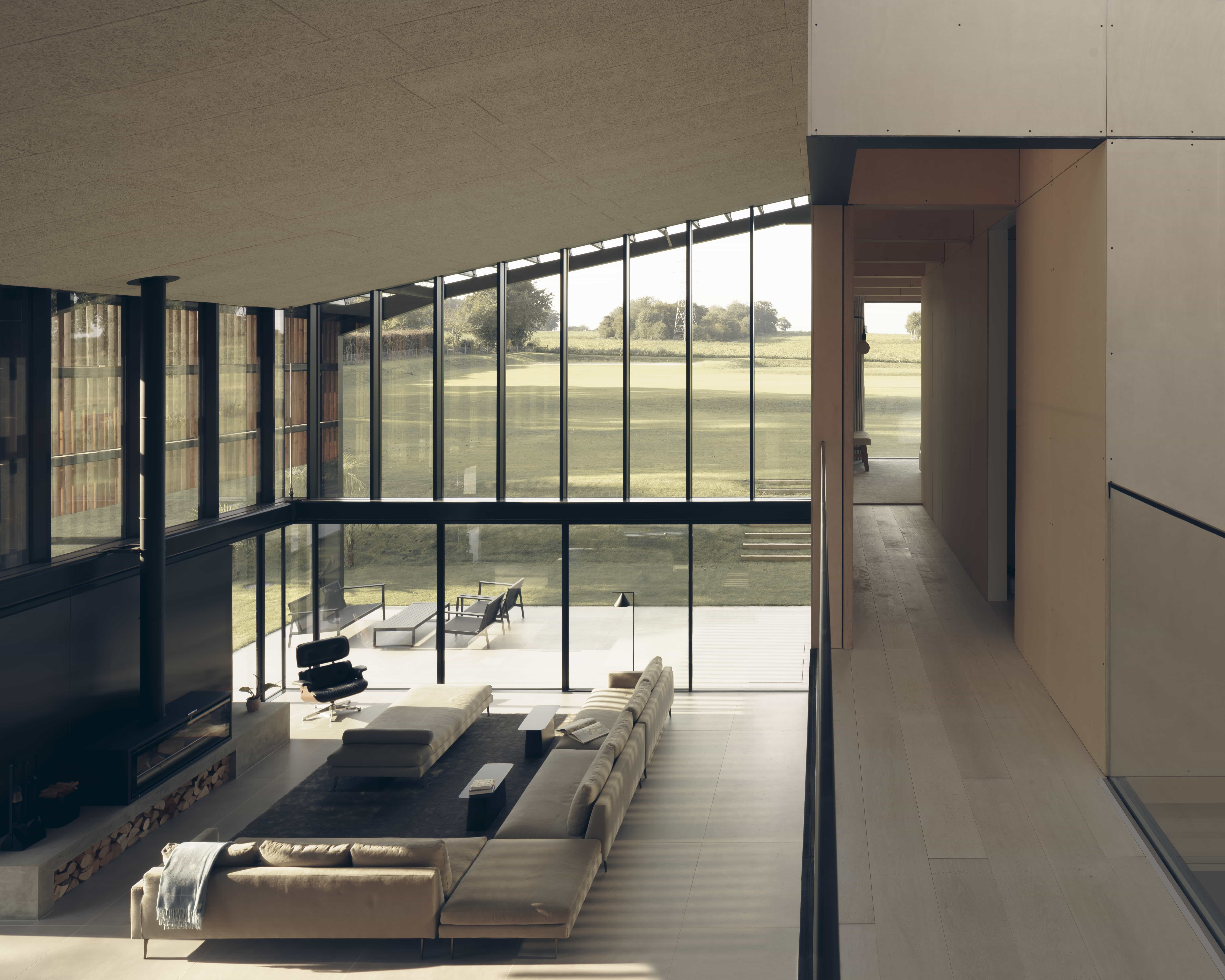 Light Barn – Love Locations ultra-modern barn with extensive glass, vaulted ceilings, high-spec interiors, and seamless indoor-outdoor living.