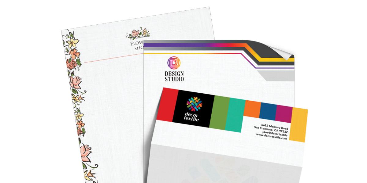 Custom business stationery set featuring branded letterheads with professional designs.