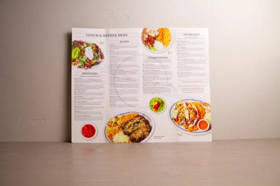 Mailer opened fully flat, showing all four menu panels —  appetizers, plates, combinations and enchiladas.
