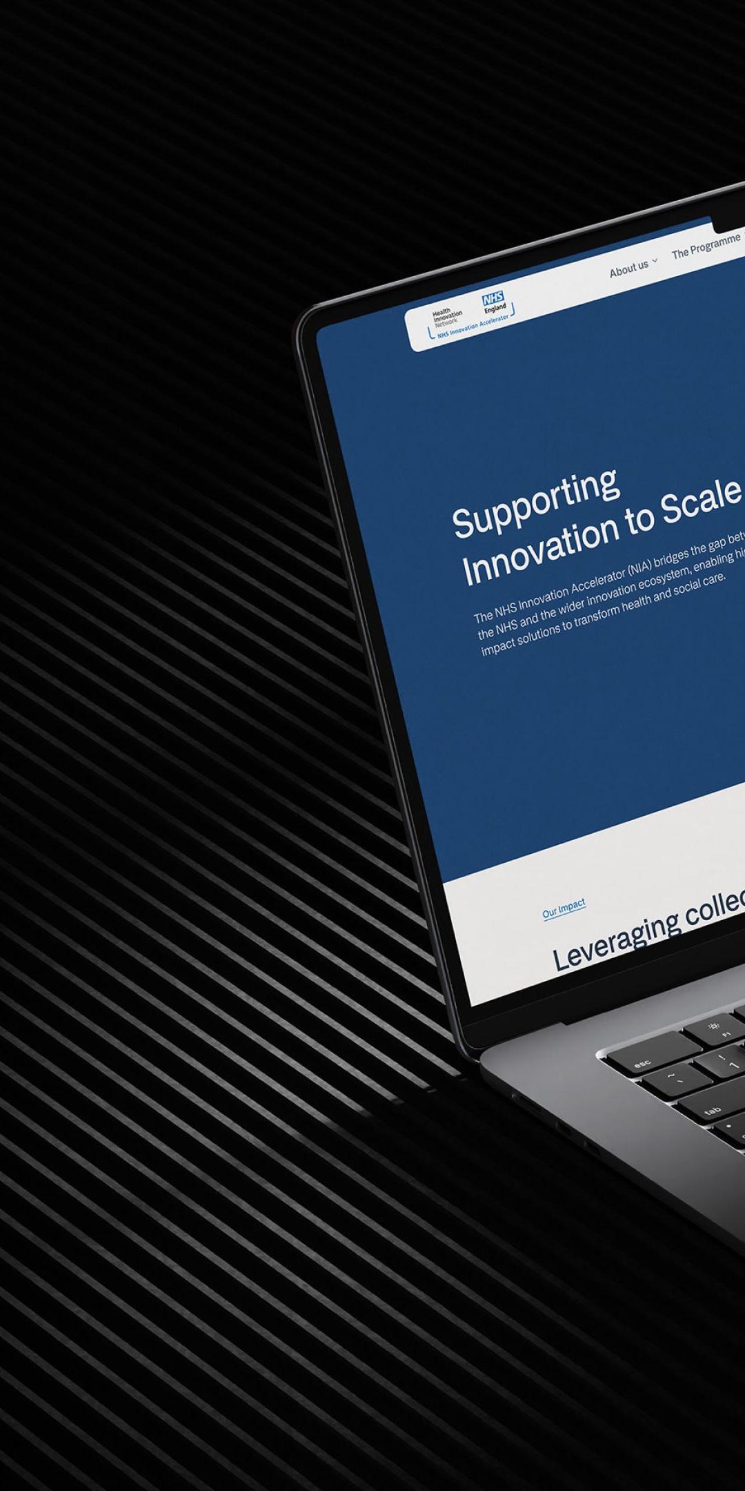 NHS Innovation Accelerator website on a laptop, headed Supporting Innovation to Scale