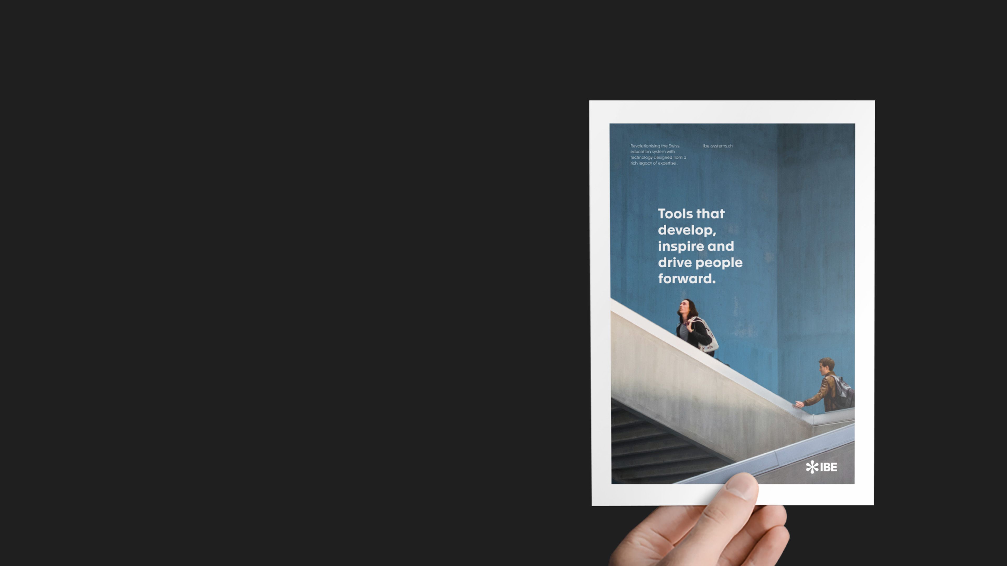 IBE brochure showing people climbing stairs under the line "Tools that develop, inspire and drive people forward"
