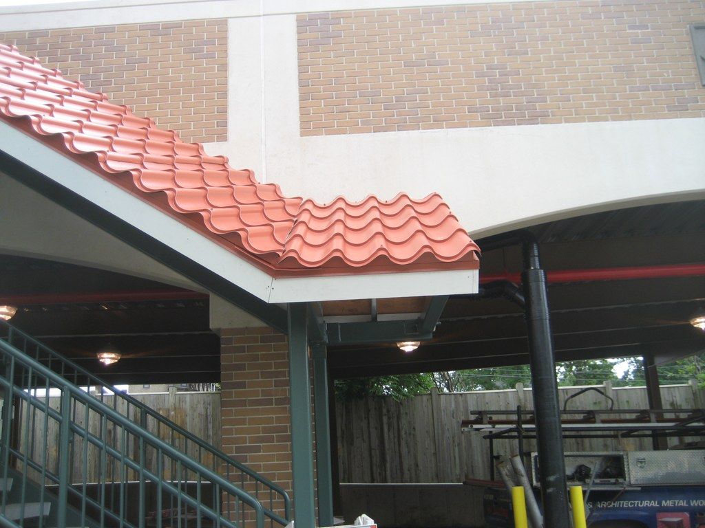 Metal tile canopy roof at the deck stair