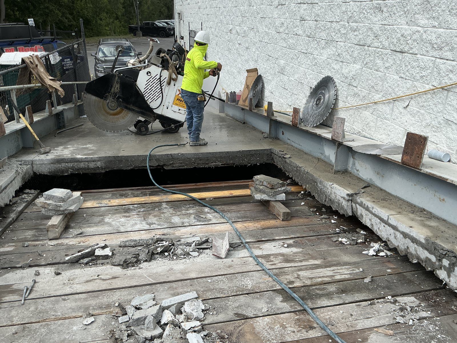 Flat sawing the deck alongside the perimeter steel