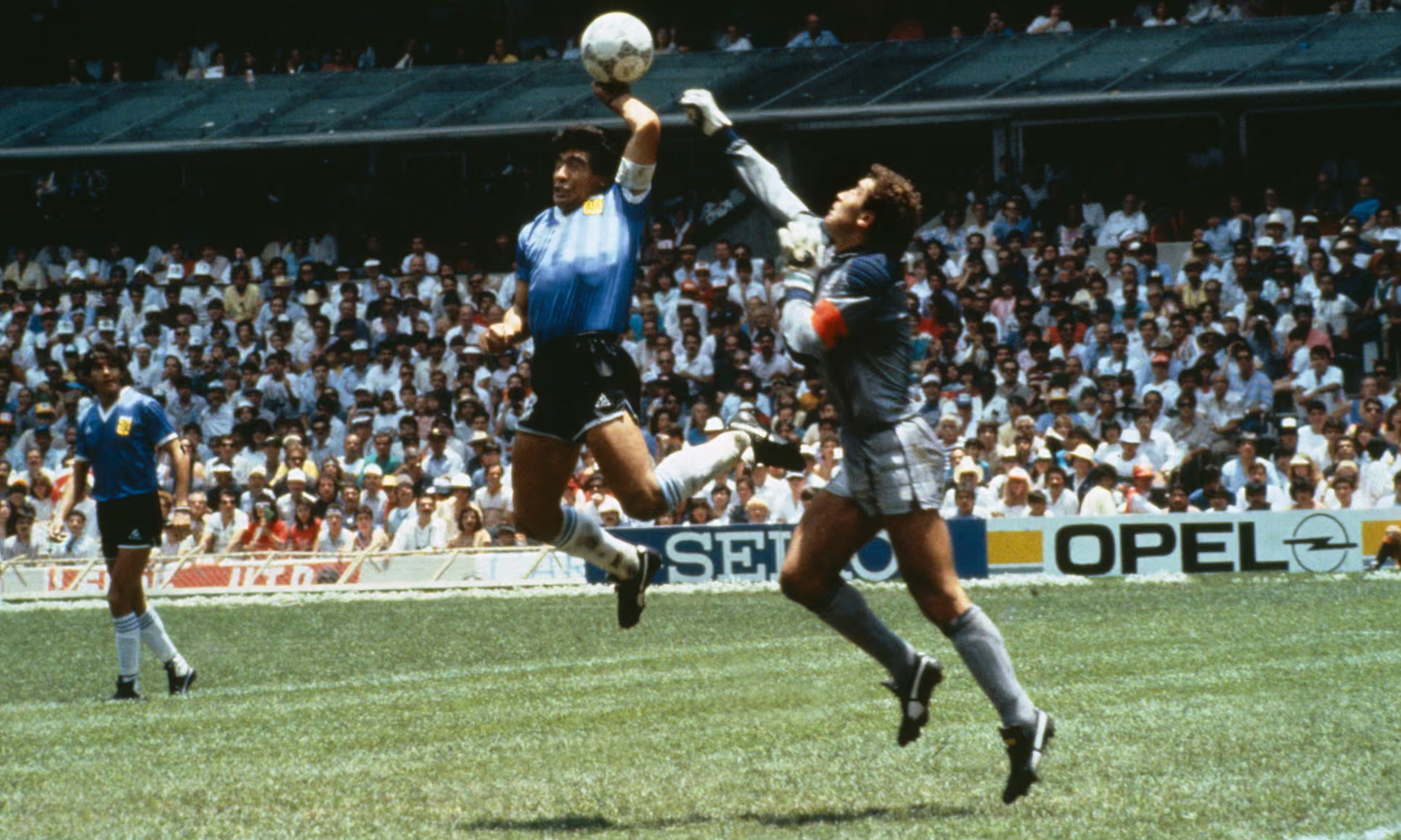 Diego Maradona tickles the ball...