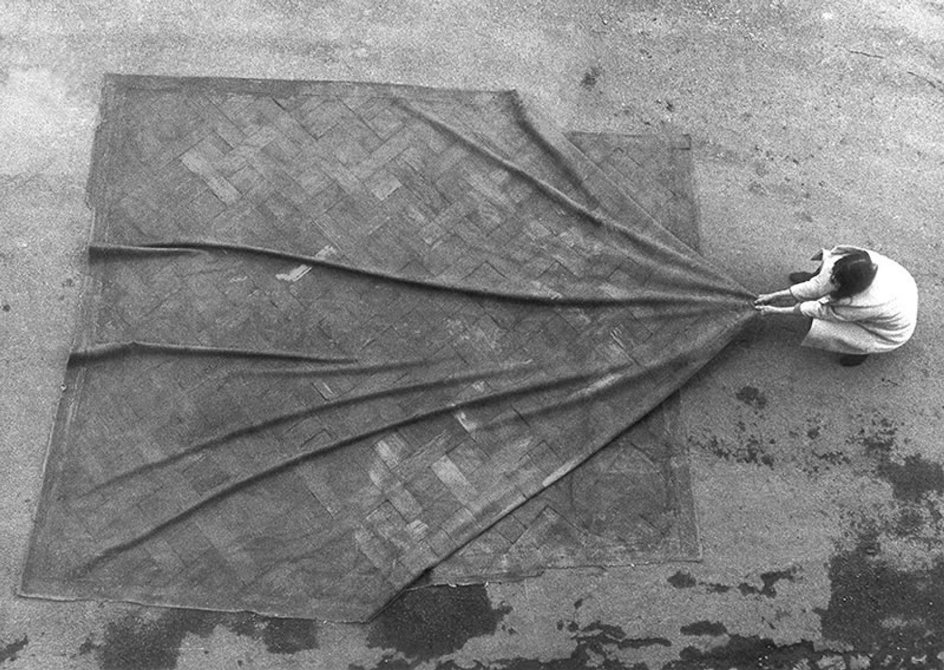 Heidi Bucher with the skinned floor of Ahnenhaus