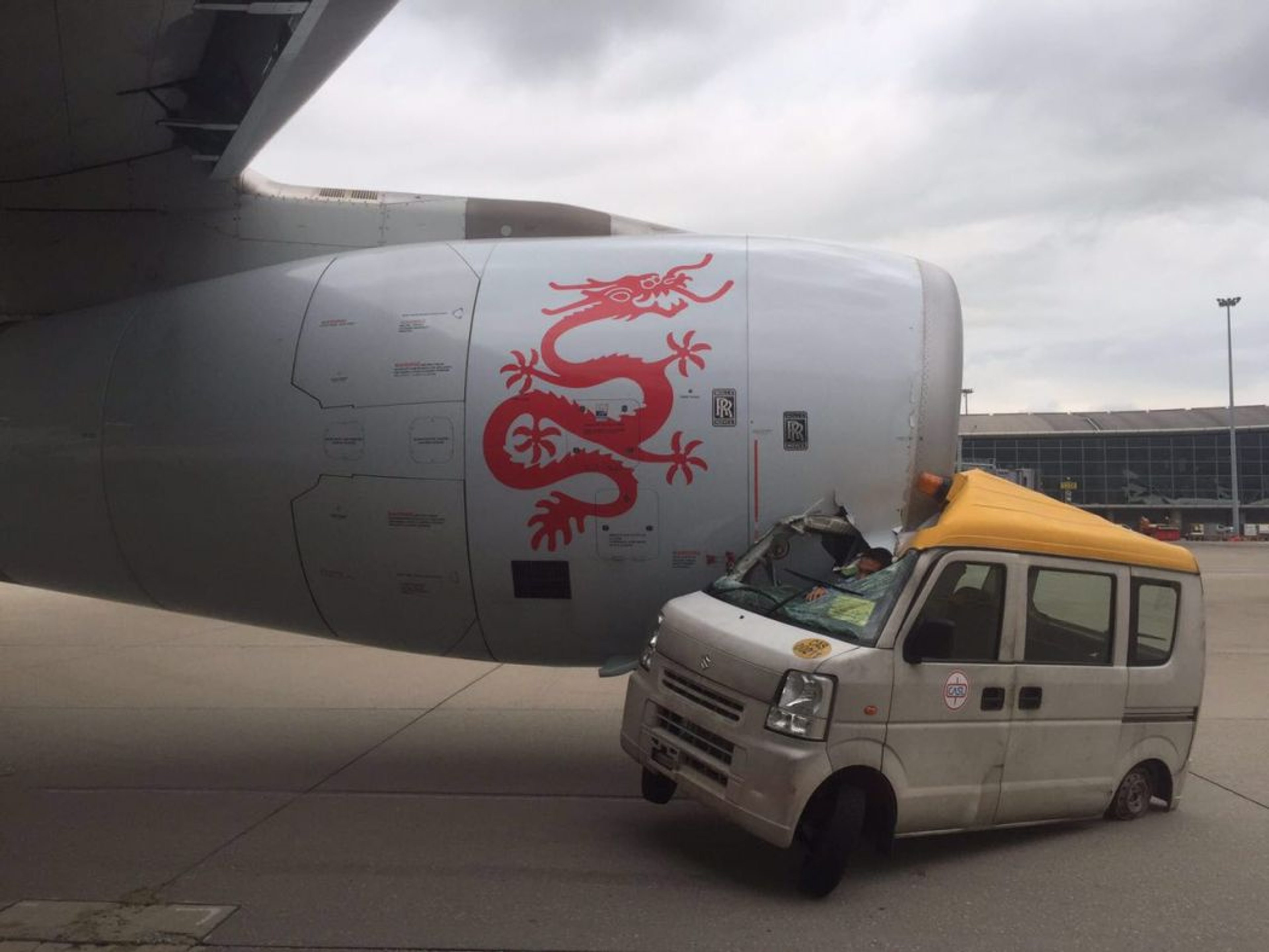 The Dragonair jet’s engine crushing the service vehicle